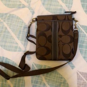 Brown Coach crossbody purse